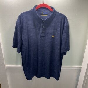 Jack Nicklaus men’s golf polo shirt, with the signature golden bear logo